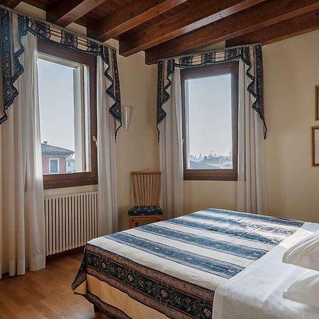 Palazzo Brando - Living Apartments Treviso Habitación foto