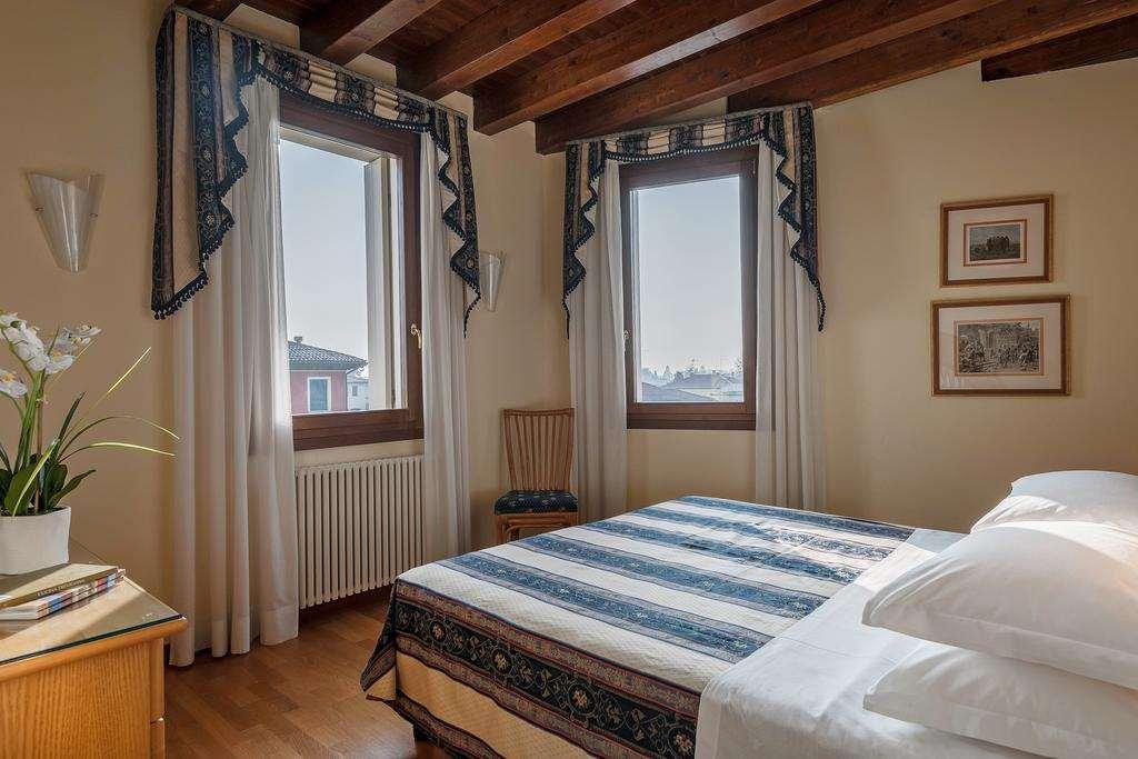Palazzo Brando - Living Apartments Treviso Habitación foto