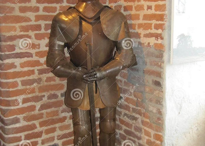 Museum Ceuclum A Brass Suit of Armor and a Stained Glass Window Stock Photo ... photo