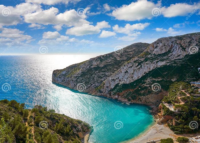 La Granadella Beach La Granadella Beach in Javea of Spain Stock Photo - Image of rock ... photo