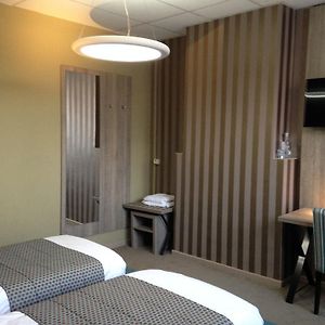 Hotel Mille Colonnes Lovaina Room photo