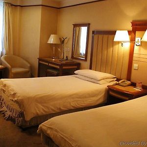Power Hotel Harbin Room photo