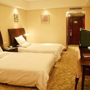 Chengyang Airport Business Hotel Qingdao Room photo