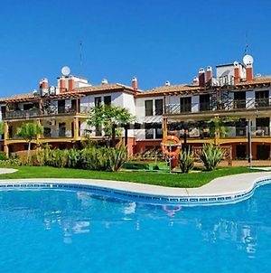 Apartamento con jardín privado y acceso a piscina Apartamento Huelva Exterior photo