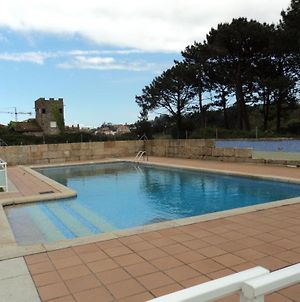 Apartamento con piscina a escasos metros de A Lanzada Apartamento Pontevedra Exterior photo