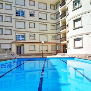 Apartamento con piscina y parking en el centro de Sanxenxo, a 100m de la playa Apartamento Exterior photo