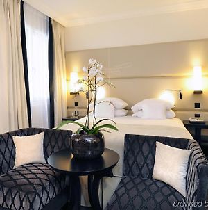 Tiffany Hotel Ginebra Room photo